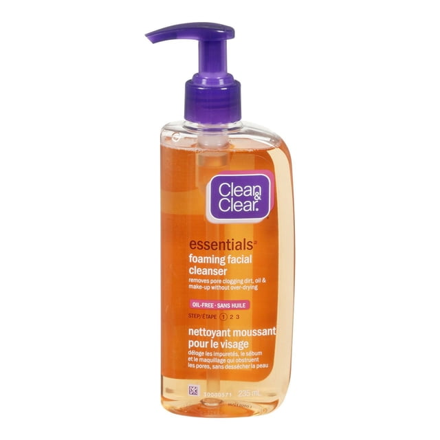 Clean & Clear Essentials Nettoyant Moussant pour le Visage en Bouteille à Pompe Transparente de 235 ml avec Liquide orange et Pompe Violette, Formule Sans Huile Qui Enlève la Saleté, l'Huile et le Maquillage Sans Trop Dessécher, Convient aux Peaux Normales, Grasses et Mixtes, Souvent Utilisé comme Nettoyant Quotidien Doux pour le Visage.
