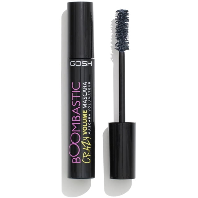 GOSH-BOOMBASTIC CRAZY MASCARA CLASSIC GREY with a black cylindrical tube and colorful text, paired with an open wand featuring a dense oversized fibre brush coated in grey mascara, designed to add volume, length, and separation without clumps, suitable for all lashes and vegan.