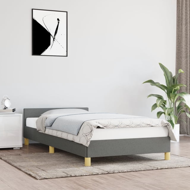 vidaXL Bed Frame with Headboard in dark grey fabric, measuring 100x203cm Twin XL, displayed in a modern bedroom setting. The bed features durable polyester fabric, sturdy legs, and plywood slats for mattress support. Ideal for bedroom furniture setups, with a bedside table, plant, and wall art complementing the scene.