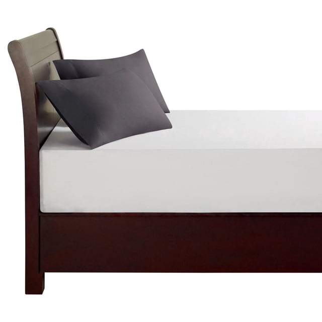 Hometrends 100% Cotton Pillowcases in dark grey on a bed with a dark wood frame and headboard, showing two standard pillowcases with 300 thread count, crisp percale weave, and brushed softness, made from breathable, lightweight cotton with envelope closure.