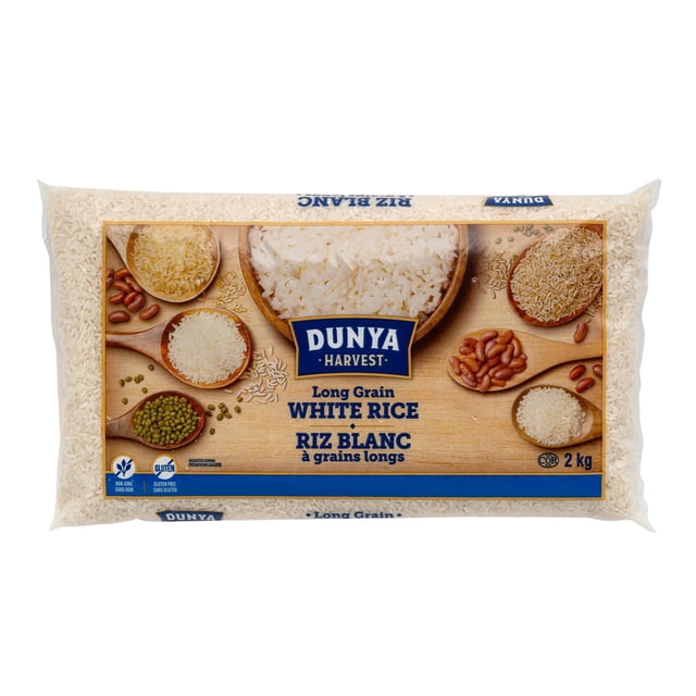 Long Grain White Rice by Dunya Harvest in a 2 kg clear plastic bag with a wooden label showing cooked white rice and various grains and beans on wooden spoons, highlighting gluten-free and non-GMO qualities and its use as a pantry staple for cooking.