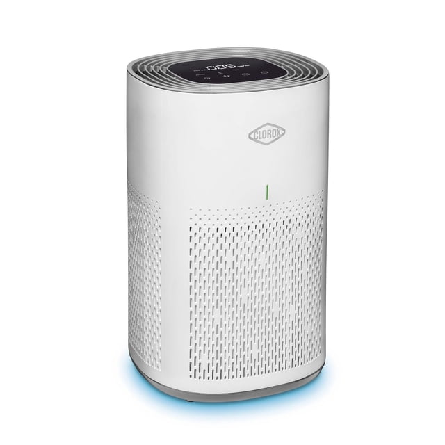 Clorox Medium Room True HEPA Filter Air Purifier 11030 in white with rounded rectangular design, perforated air intake vents on front and sides, digital display on top showing air quality and controls, and green indicator light, suitable for medium rooms with 3-stage 360° filtration and auto mode for continuous air quality monitoring.
