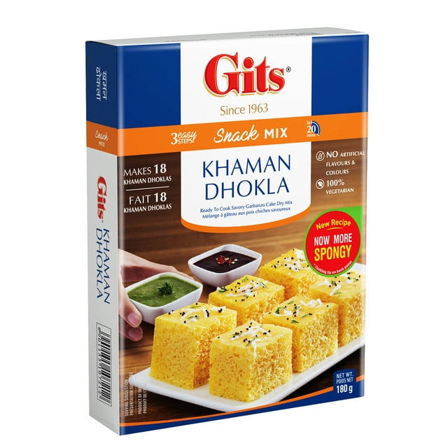 Gits Mélange de Khaman Dhokla Boîte de 180 g avec Emballage Bleu et Blanc Montrant six Carrés de Khaman Dhokla Jaunes Spongieux Garnis de Graines de Moutarde et d'Herbes dans une Assiette Blanche, Servis avec des chutneys Verts et de Tamarin, Mettant en Valeur une Préparation Rapide en 3 Étapes, 100 % Végétarien, Sans Colorants Ni Arômes Artificiels, et Fait 18 Portions, Idéal pour une Collation Indienne Légère.