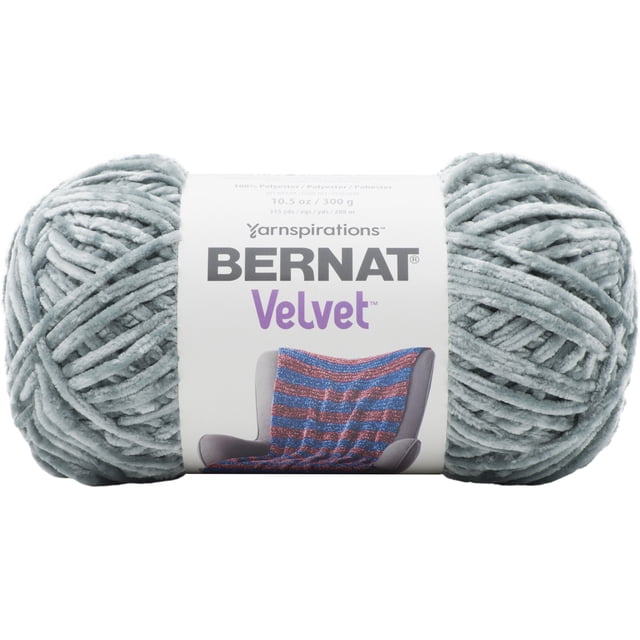 Bernat® Velvet™ Yarn, Polyester #5 Bulky in light grey, 10.5oz/300g skein with plush, velvety texture and 315 yards length, ideal for knitting and crochet projects including blankets and pillows, featuring a bulky gauge suitable for 6.5 mm needles and hooks.