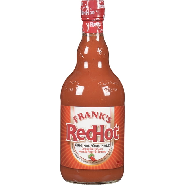 Frank's RedHot, Hot Sauce, Original 680ml clear glass bottle containing cayenne pepper sauce with a red label and sealed red cap, suitable for adding flavour and heat to a variety of dishes.