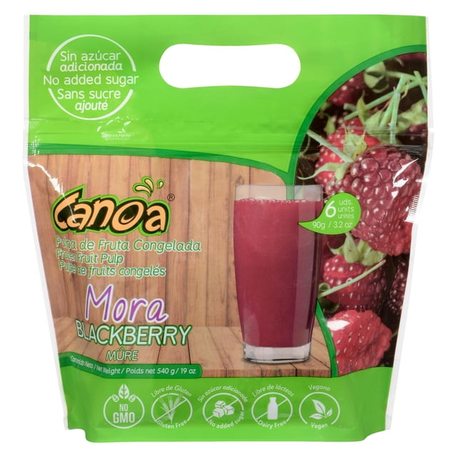 Canoa frozen blackberry pulp package with six 90 g units, featuring a green top with handle, wood-textured background, a glass of dark purple blackberry juice, and icons for no added sugar, gluten-free, dairy-free, non-GMO, and vegan, ideal for smoothies and desserts.