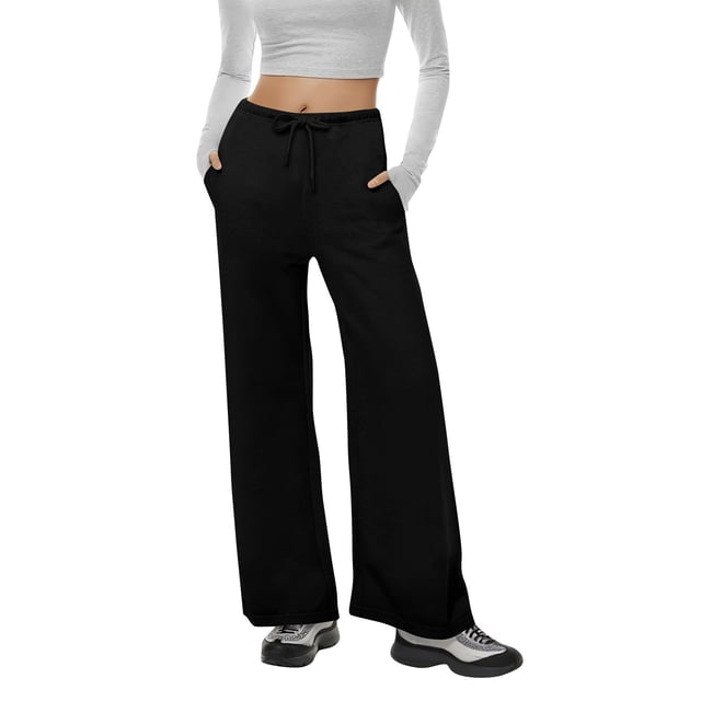 Ohufall Womens Sweatpants in black, featuring a relaxed straight-leg design, adjustable drawstring elastic waistband, and convenient side pockets. Made from soft, breathable, and stretchable fabric, these low-rise jogger pants are perfect for casual wear, exercise, or lounging. Styled with a white cropped top and sneakers.