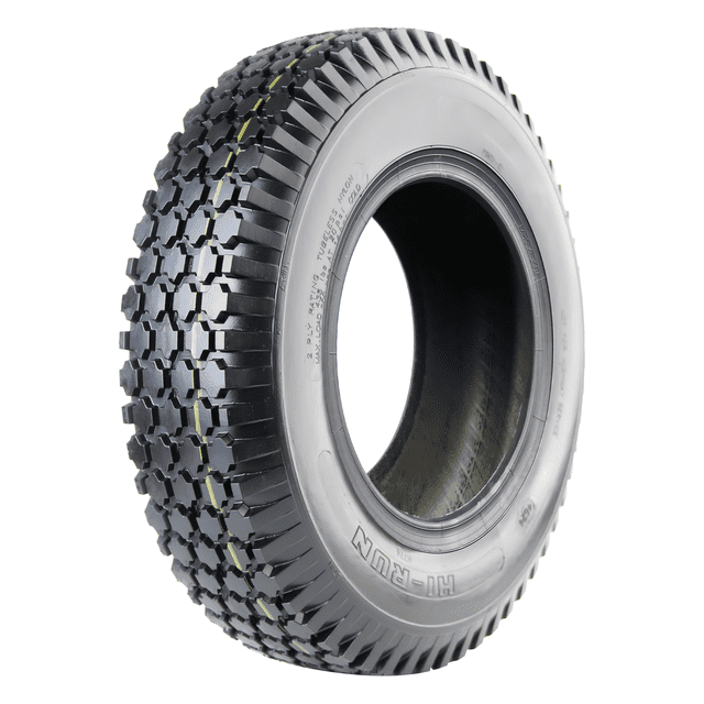 Hi-Run SU14 Pneu de Pelouse et de Jardin à Crampons 4.10/3.50-4 2PR Montré dans une Vue de Profil 3/4 avec Motif de Bande de Roulement à Crampons Carrés Agressifs Profondeur 5/32 Pouces, construction Sans Chambre à Air 2 Plis Supportant 230 lb à 24 psi, Jante Compacte de 4 Pouces Convient aux Tondeuses à Poussée de 20-22 Pouces et aux Petites Tondeuses à Chevaucher, Convient comme Remplacement OEM.