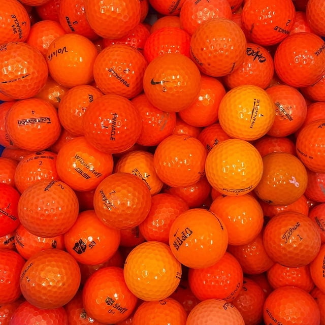 Mulligan - 100 Mix AAA Recycled Used Golf Balls, Orange showing a close-up of numerous orange dimpled golf balls from mixed brands including Pinnacle, Wilson Staff, Titleist, and Nike, highlighting their recycled AAA quality ideal for eco-friendly golf practice and players of all skill levels.