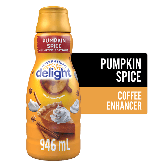 International Delight Coffee Creamer, Seasonal Edition 946ml Front-facing 946ml plastic bottle of pumpkin spice coffee creamer with cream-colored label, orange pumpkin graphic and International Delight logo; label shows nutrition callouts (35 cal per 15ml, gluten-free). Screw-cap top, white background. Ideal for adding a splash to coffee and suitable for pumpkin-flavored baking.