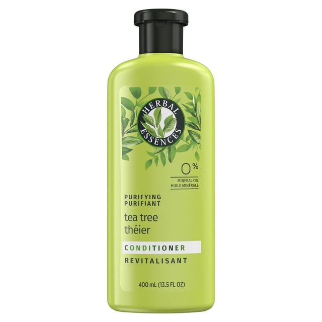Herbal Essences Classics Clarifying Tea Tree Conditioner in a 400 mL light green bottle with black flip-top cap, featuring the Herbal Essences logo surrounded by tea tree leaves, mineral oil-free purifying formula that detangles and protects colour-treated hair for soft, voluminous results.