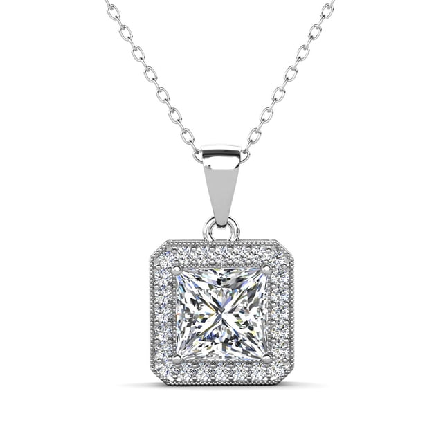 Cate & Chloe Ivy 18k White Gold Plated Pendant Necklace with Simulated Diamonds. This elegant necklace features a 6mm princess-cut simulated diamond center stone surrounded by 24 sparkling accent stones in a halo setting. The pendant measures 11mm by 11mm and is suspended from an 18-inch cable chain with a secure lobster clasp. Ideal for formal events, casual outings, or as a thoughtful gift, it comes in a luxury gift box and is hypoallergenic, lead-free, and nickel-free.
