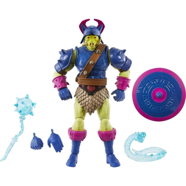 Masters of the Universe Masterverse Pig-Head action figure, 7 inches tall, featuring blue spiked armor, purple horned helmet, and green skin. Includes blue and pink shield, translucent blue morningstar, snake accessory, and two sets of swappable hands. With 30 points of articulation, it supports dynamic posing and creative storytelling.
