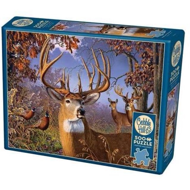 Cobble Hill Casse-Tête de 1000 Pcs Présentant une illustration Détaillée de Cerfs et de Faisans dans un Cadre Forestier. la Boîte de Casse-Tête Affiche des Couleurs Automnales Vibrantes et Comprend la Marque Cobble Hill Bien en Vedette sur le devant.