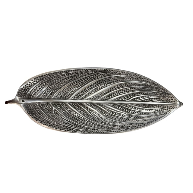 METAL INCENSE HOLDER shaped like an elongated leaf with detailed raised vein patterns and perforated holes throughout, finished in matte silver metal, designed for holding incense sticks, shown from a top-down view on a white background.