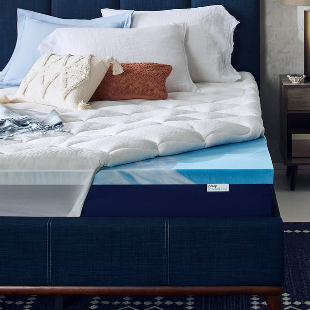 Sleep Innovations Cool Comfort Dual Layer 4 Inch Memory Foam Mattress Topper, King Size, shown on a bed. The topper includes a 2-inch cooling gel memory foam layer and a 2-inch quilted pillow top cover for medium plush comfort. Features include a cool-touch fiberfill cover, pressure relief, motion isolation, and CertiPUR-US certified foam for durability. Displayed in a cozy bedroom setting with pillows and bedding.