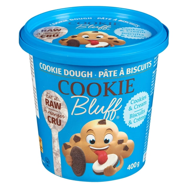 Cookie Bluff Cookies & Cream Cookie Dough in a blue 400g tub featuring a cartoon cookie character holding a cookies and cream sandwich, labeled for refrigerated storage and safe to eat raw, made with butter and quality ingredients, suitable for baking or eating as is.