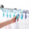 thumbnail image 3 of Solid Color Portable Fabric Clothes Hanger For Business Trips Foldable Clothes Drying Clip For Wardrobe Socks Hats Storage Clothes Clip, 3 of 6