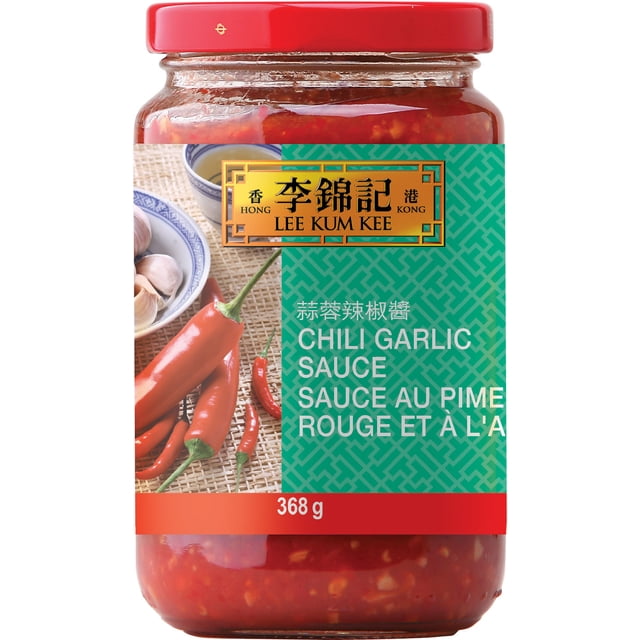 LKK CHILI GARLIC SAUCE in a clear glass jar with a red lid, containing a chunky red chili and garlic blend. The label features the Lee Kum Kee gold logo on a green patterned background with images of red chili peppers and garlic cloves on a woven mat. This 368 g mildly hot sauce is ideal for dipping and stir-frying meats, fish, vegetables, and noodles, and is also suitable as a versatile cooking sauce.