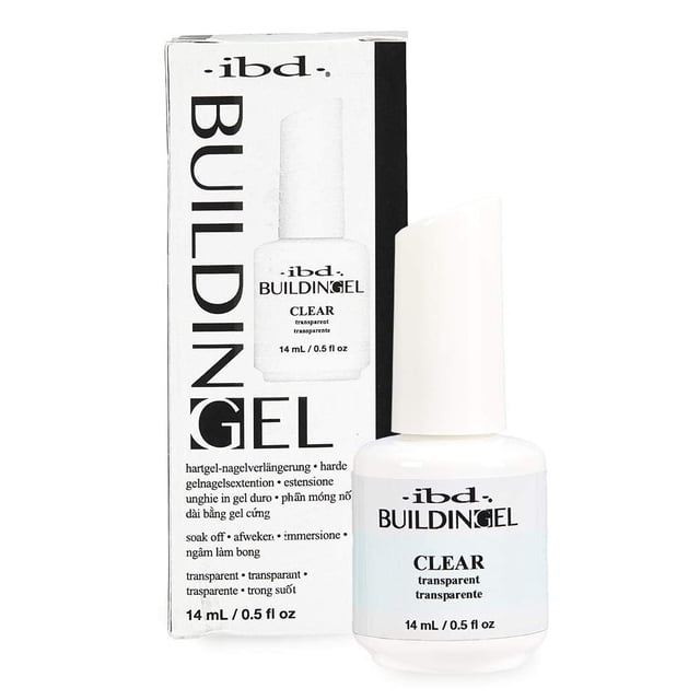 IBD Building Gel, Hard Gel Nail Extension, Clear, 0.5 oz bottle displayed alongside its packaging. The bottle features a white design with black text, highlighting its clear gel formula for nail extensions. The packaging includes multilingual product details and branding.