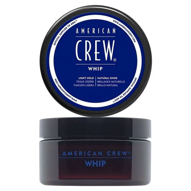 American Crew Whip 3oz whipped formula with light, airy hold for a natural look and added volume; centered front-facing jar with black screw lid and white label, whipped texture visible, often used to tame flyaways or add lightweight texturizing.