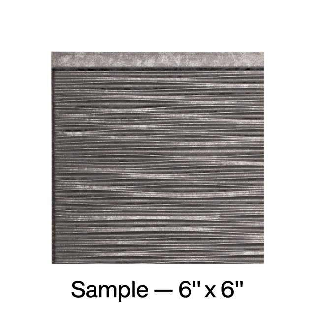 FASÄDE Ripple Decorative Vinyl Backsplash Panel in Galvanized Steel, displayed as a 6x6 inch sample. The panel showcases a ripple texture with a metallic galvanized steel finish, suitable for DIY home improvement projects like kitchen backsplashes, accent walls, or office decor.