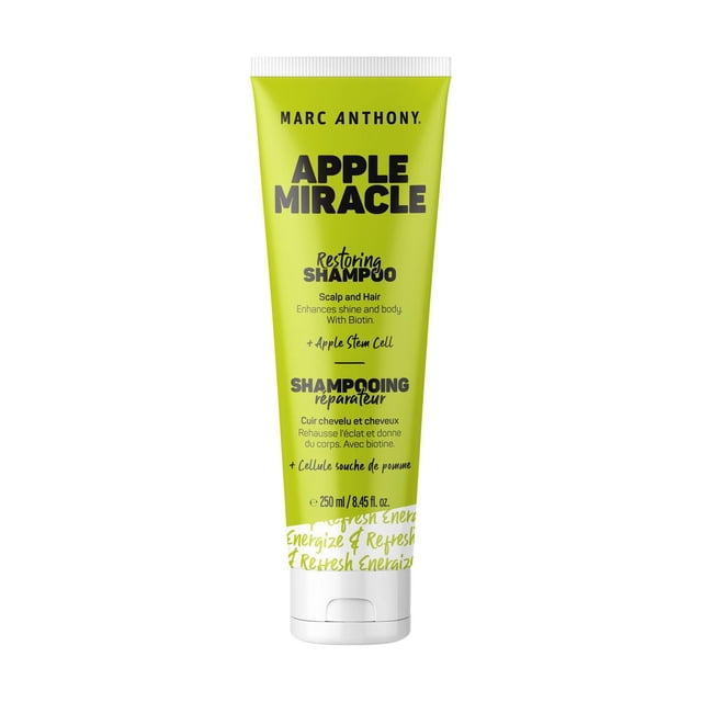 Marc Anthony Apple Miracle Restoring Shampoo in a green 250 ml tube with white flip cap, formulated with apple stem cell and biotin to restore vitality to dry scalp and damaged hair while enhancing moisture, shine, body, and protection.