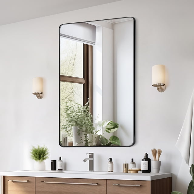 Square Wall Mounted Mirror 30" x 48" with an aluminum alloy frame displayed in a modern bathroom setting. This wall mirror features a brushed aluminum frame, high-definition glass with anti-shatter film, and fog-free technology. Positioned above a wooden vanity with decorative plants and toiletries, it enhances home decor and functionality.