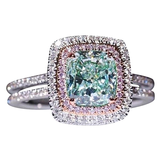 Bague de Mode pour Femme avec un Centre de Table Rond en Diamant Vert Entouré de Pierres Roses et Blanches, au design à double halo. Cette Bague pour Femme Est Fabriquée en Alliage et Dotée d'Un Anneau Épuré, Convient comme Bague de Mariage Ou Cadeau. Sa Taille Est d'Environ 2 cm.