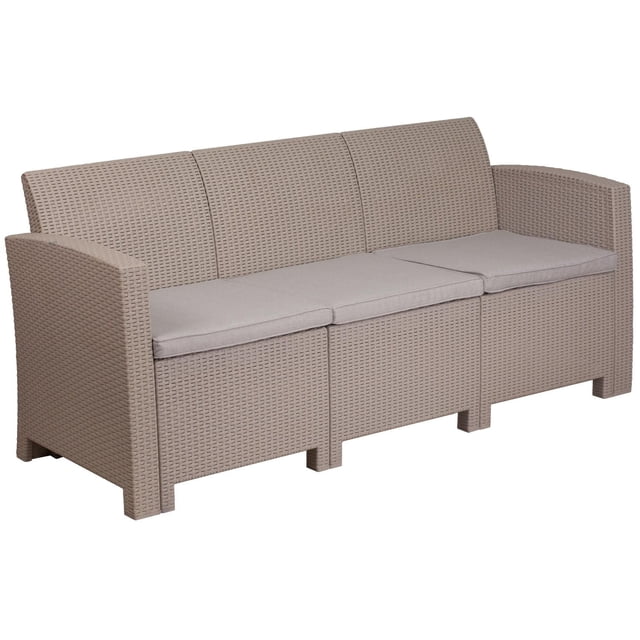 Sofa en fausse rotin gris clair avec coussin gris clair tout temps