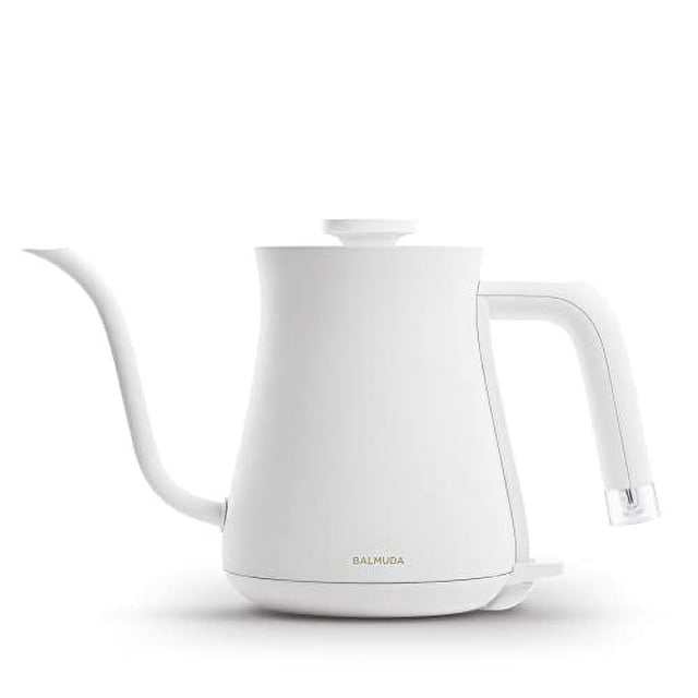 BALMUDA The Pot Electric Kettle, White, 2022 Model. A sleek, modern electric kettle with a stainless steel body and polypropylene lid and handle. Features a precision gooseneck spout for controlled pouring, a compact design, and a white matte finish. Includes safety features like automatic power-off and boil-dry protection. The power cord can be stored in the holder on the power base for a tidy countertop.