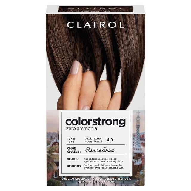 ColorStrong Permanent Hair Dye by Clairol in dark brown 4.0 tone with zero ammonia, offering multidimensional color and AHA bonding system to reinforce hair structure, displayed in a box featuring a hand holding dark brown hair strands over a Barcelona cityscape background.
