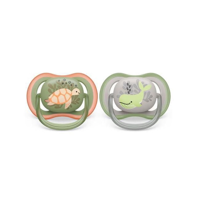 Philips Avent Ultra Air Pacifier 6-18m 2 pack with orange turtle and green whale designs, lightweight breathable shields with four large holes to keep baby's skin dry, soft silicone nipples for comfort, BPA-free, and includes sterilizer case.