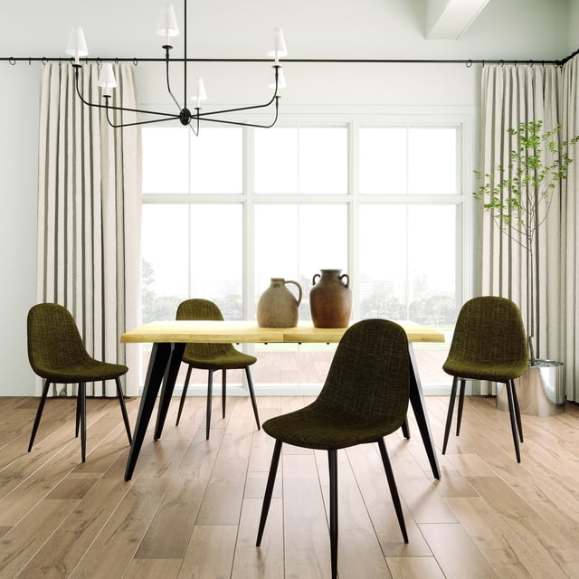 Homy Casa Modern Rectangular 5-Piece Dining Set with a 63-inch faux wood live edge table and black angled metal legs, paired with four dark olive upholstered armless chairs featuring ergonomic scooped seats and black metal legs, set in a bright dining room with beige curtains, wood flooring, a black multi-arm chandelier, and ceramic vases on the table. Ideal for family meals and casual gatherings.