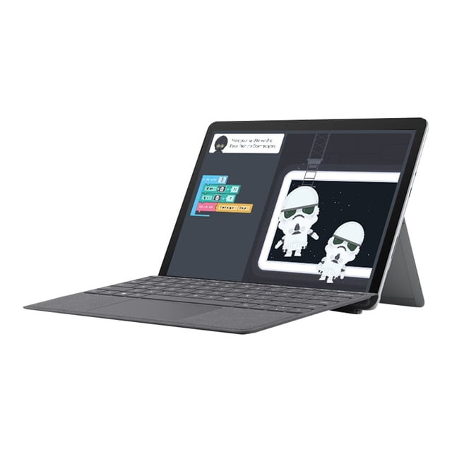 New Microsoft Surface Go 2 - 10.5-inch touch-screen tablet in platinum, shown with an adjustable kickstand and attached Signature Type Cover. Features Intel Pentium processor, 4GB memory, and 64GB storage. Includes USB-C port, headphone jack, and Full HD front- and rear-facing cameras. Ideal for browsing, shopping, emails, and homework. Lightweight at 1.2 pounds and offers up to 10 hours of battery life. Displayed with a coding application on the screen.