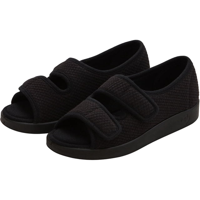 Silverts Women In & Outdoor Easy Closure Open Toe Slippers in size 10, black. These adjustable slippers feature a textured black fabric upper with two easy-closure straps for customizable fit. Designed for elderly women, they include cushioned insoles, anti-microbial protection, slip-resistant soles, and washable material. Suitable for swollen feet and ankles, ideal for home care or rehabilitation settings.