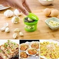 thumbnail image 1 of Outil de Cuisine Multifonction pour Ail avec Broyeur, Trancheur, Râpe et Contenant de Rangement Intégré pour Légumes Frais, 1 of 6