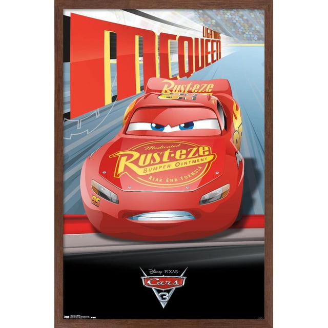 Disney Pixar Cars 3 - Lightning Wall Poster, 22.375" x 34" Framed showing a centered front view of red Lightning McQueen with yellow Rust-eze bumper ointment logo on hood and spoiler, racing on a blue oval track with large red and yellow 'McQueen' text in the background, framed in dark wood.