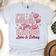 thumbnail image 1 of Women’s Graphic Tee with Heart Lollipop Design for Maternity Nurses, Ash, Size L, 1 of 6