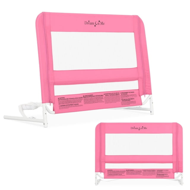 Dream On Me Mesh Security Bed Rail in pink with breathable mesh fabric and padded frame, supported by a white metal base with safety warning labels, designed for twin beds with mattress heights up to 5 inches, featuring no-tool assembly and rounded no-catch edges for child safety.