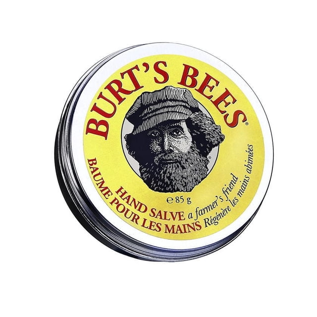Burt's Bees Hand Salve with Vitamin E and Beeswax in a round metal tin with a yellow label featuring a bearded man in a cap, 85 g. This hand salve nourishes and protects extremely dry hands with botanical oils, herbs, and beeswax that seal in moisture.