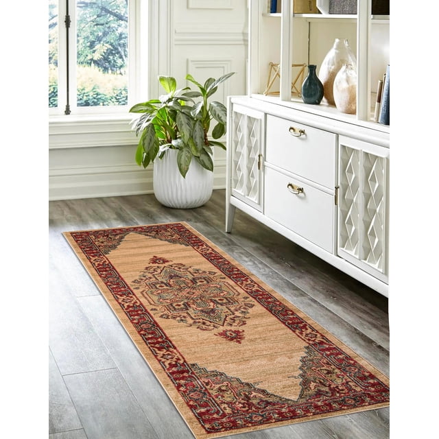 ECARPET Lux Traditional Runner Rug for Living Room, Bedroom, Dining Room, Entrance, Hallway and More with a beige field featuring a central geometric medallion and floral patterns in crimson red, blue, and gold, bordered by an intricate crimson red design, power-loomed from soft synthetic fibers, displayed on a grey wood floor beside a white decorative cabinet and a large potted green plant near a window, also suitable for adding classic style to narrow spaces like hallways or entryways.