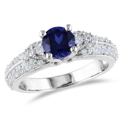 Bague de fiançailles Tangelo avec 1.67 carat de saphir bleu et blanc synthétique en argent sterling