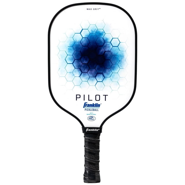 Pilot Pickleball Paddle with a white MaxGrit fiberglass surface showing a blue hexagonal pattern in the center, black edge guard, and a black non-slip comfort grip handle, USA Pickleball (USAPA) approved by Franklin Sports, suitable for precise control and spin shots.