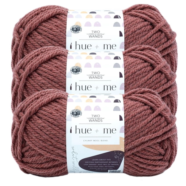 Lion Brand Hue + Me Yarn - Juniper, bulky weight blend of 80% acrylic and 20% wool, shown as three stacked skeins with white labels featuring Two of Wands branding and pastel semi-circle patterns, ideal for knitting accessories, garments, blankets, and home décor, machine washable and dryable.