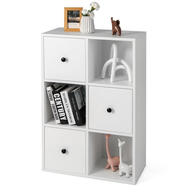 Costway 6-Cube Bookcase Storage Organizer in white with three open cubes and three drawers, ideal for kids' furniture or home office use. The bookcase displays books, decorative items, and figurines in the open cubes. Features include anti-toppling devices and non-slip foot pads for stability.