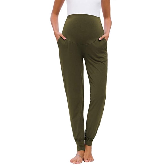 Maternity women's solid color casual pants in a stretchy and comfortable design, shown in an olive green shade. These lounge pants feature a high-waisted fit with an elastic waistband that provides full support for the abdomen, making them suitable for pregnant women. The tapered legs and soft polyester fabric ensure breathability and warmth, ideal for casual wear or outdoor activities. The model is barefoot, showcasing the relaxed fit and ankle-length design.