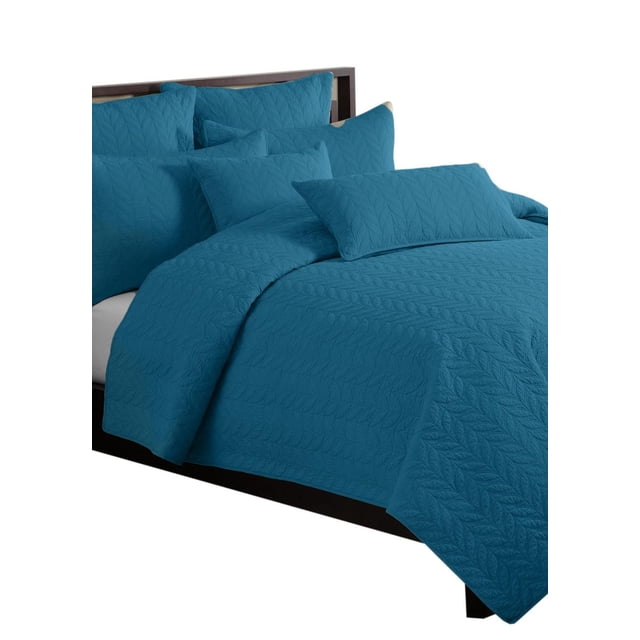 Gouchee Home Leaf Solid Quilt Set – queen size teal cotton quilt set with a lightweight leaf stitch pattern and two matching pillow shams, breathable and machine washable for all-season use, displayed on a dark wood bed frame.