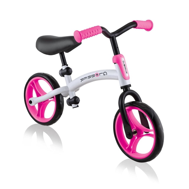 Globber GO BIKE Balance Bike – White/Neon Pink with lightweight steel frame, adjustable black seat with soft non-slip TPR, neon pink TPR handlebar grips, and 8.5-inch puncture-free EVA foam tires for kids 2-5 years learning balance and coordination.