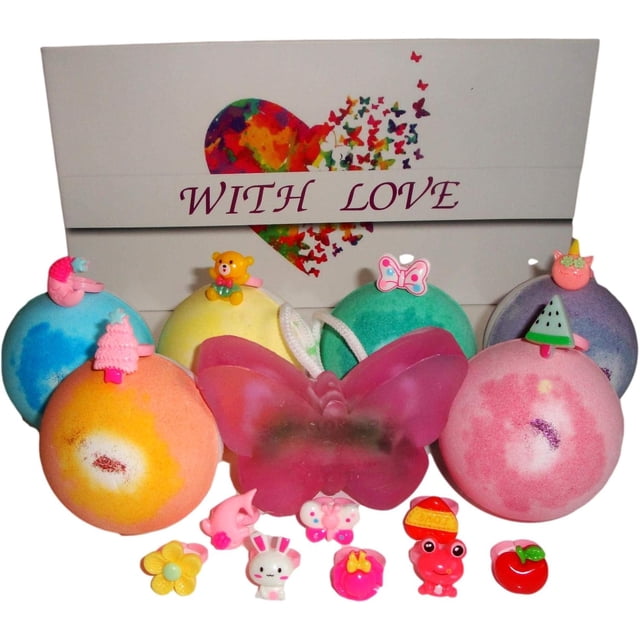 KIDS BATH BOMBS WITH A SURPRISE TOY INSIDE & BUTTERFLY SOAP ON THE ROPE Colored XL Bath Bombs. The image displays six colorful bath bombs, each topped with a unique ring toy, and a pink butterfly-shaped soap on a rope. These bath bombs are handmade, vegan, and infused with organic essential oils, ensuring they are safe for kids. The set offers 180 ring designs, adding excitement to bath time. A decorative box with a heart design and the words 'WITH LOVE' is included in the background.